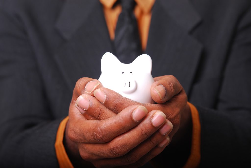 businessman-piggy-bank-savings